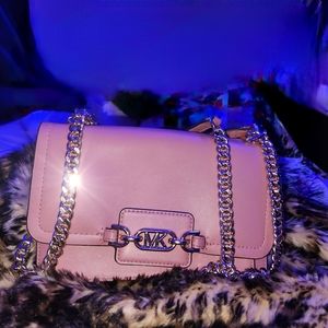 Beautiful New pink w tags MK leather purse.